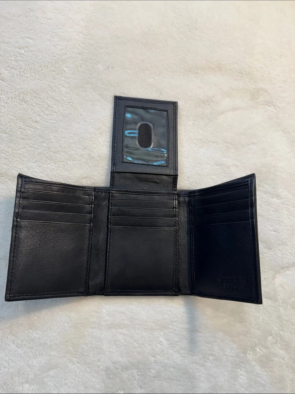 NWOT Lord & Taylor black leather tri-fold wallet.